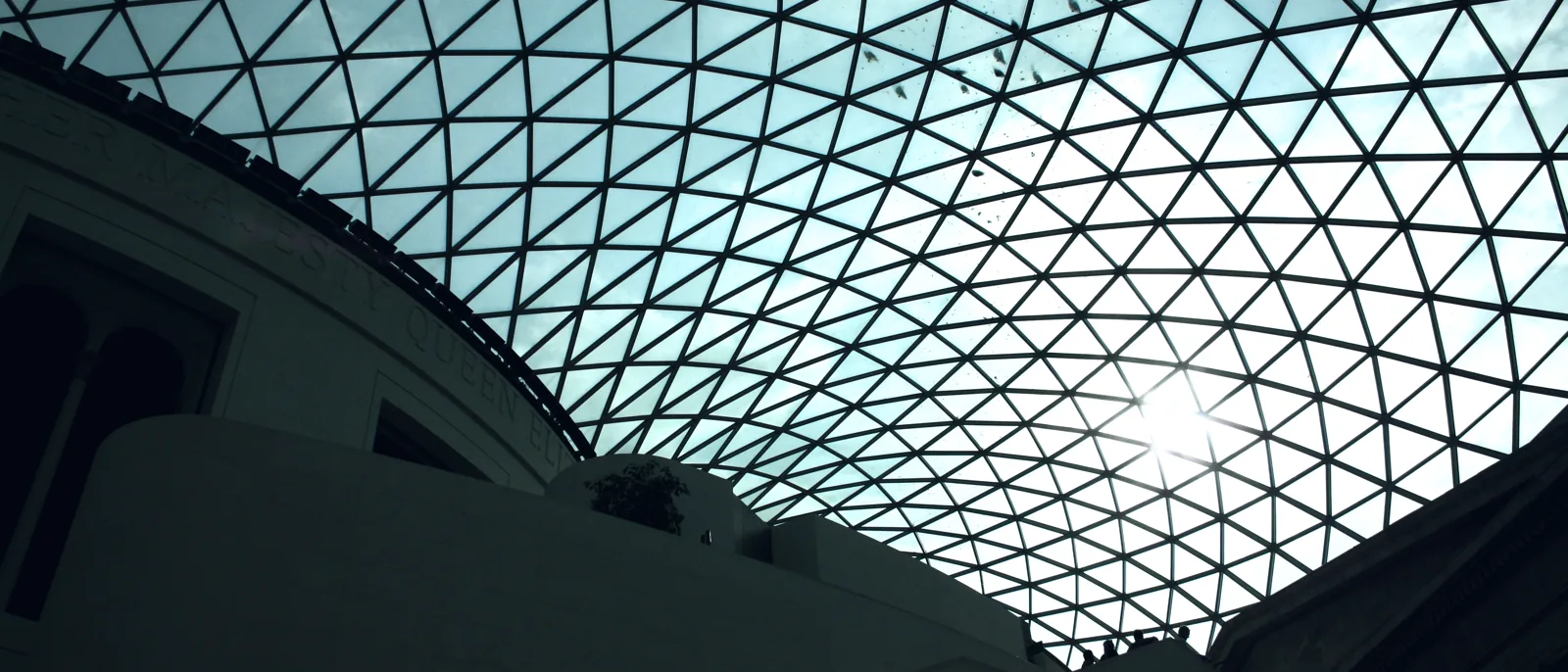 The geometric glass and steel lattice roof of the Great Court
